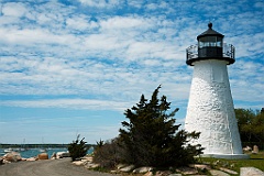 Lighthouse Overlooks Harbor